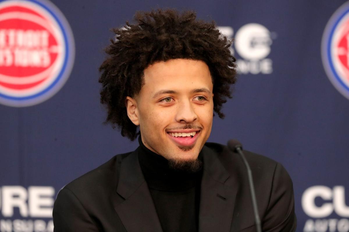 Detroit Pistons first-round draft pick Cade Cunningham answers questions from reporters after the news conference on Friday, July 30, 2021, at the team's practice facility in Detroit.