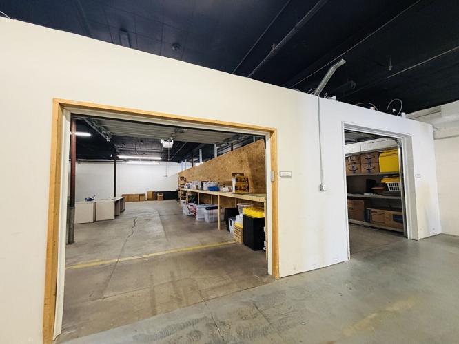 Kindness Closet wall between warehouses before