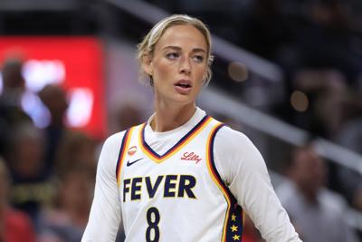 Sophie Cunningham #8 of the Indiana Fever looks on against the New York Liberty during the first half at Gainbridge Fieldhouse on Aug. 11, 2026, in Indianapolis, Indiana.