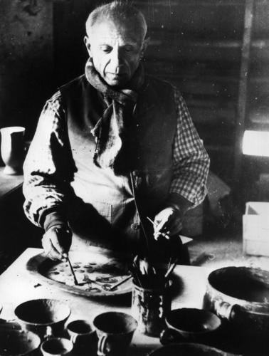 Spanish artist Pablo Picasso at work in his Mougins pottery works, France, circa 1948..