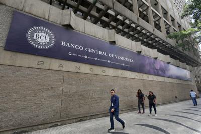 FILE PHOTO: Venezuela debt restructuring to bring country 'out of shadows,' central bank chief says