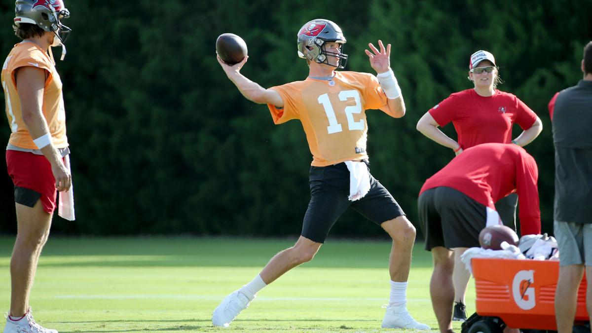 Tom Brady loads up a pass during Bucs training camp on Monday, August 2, 2021.