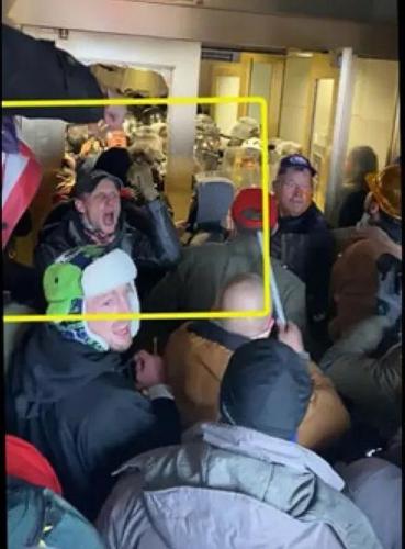 Lewis Easton Cantwell is depicted in this video of the Jan. 6 Capitol riot.