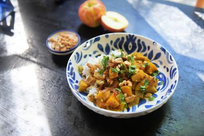 Diced apple and butternut squash add seasonal fall flavor to this easy vegetarian curry.