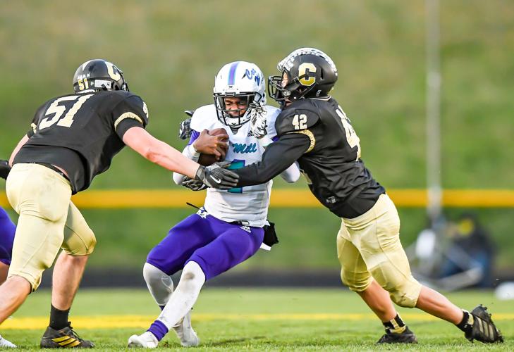 Cox Mill defeated Concord 21-20 on a botched extra point with less than a minute to play.