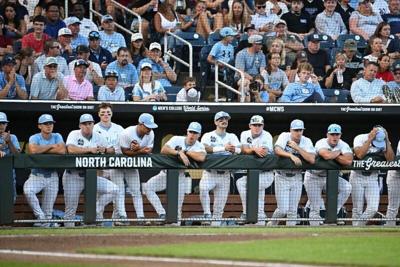 Jun 22, 2026; Omaha, NE, USA;  The North Carolina Tar Heels bench watches action against the Oklahoma Sooners during the fourth inning at Charles Schwab Field. Mandatory Credit: Steven Branscombe-Imagn Images