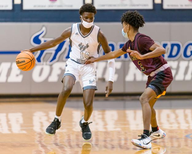 Boys Basketball: The Boys Jay M. Robinson Bulldogs defeated the Hickory Ridge RaginÕ Bulls 72-69 on Thursday night.