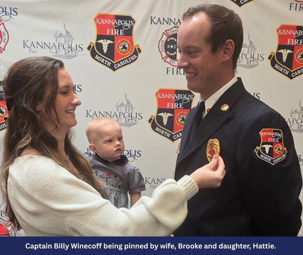 Capt Billy Winecoff pinned by his wife Brooke and daughter Hattie.jpg