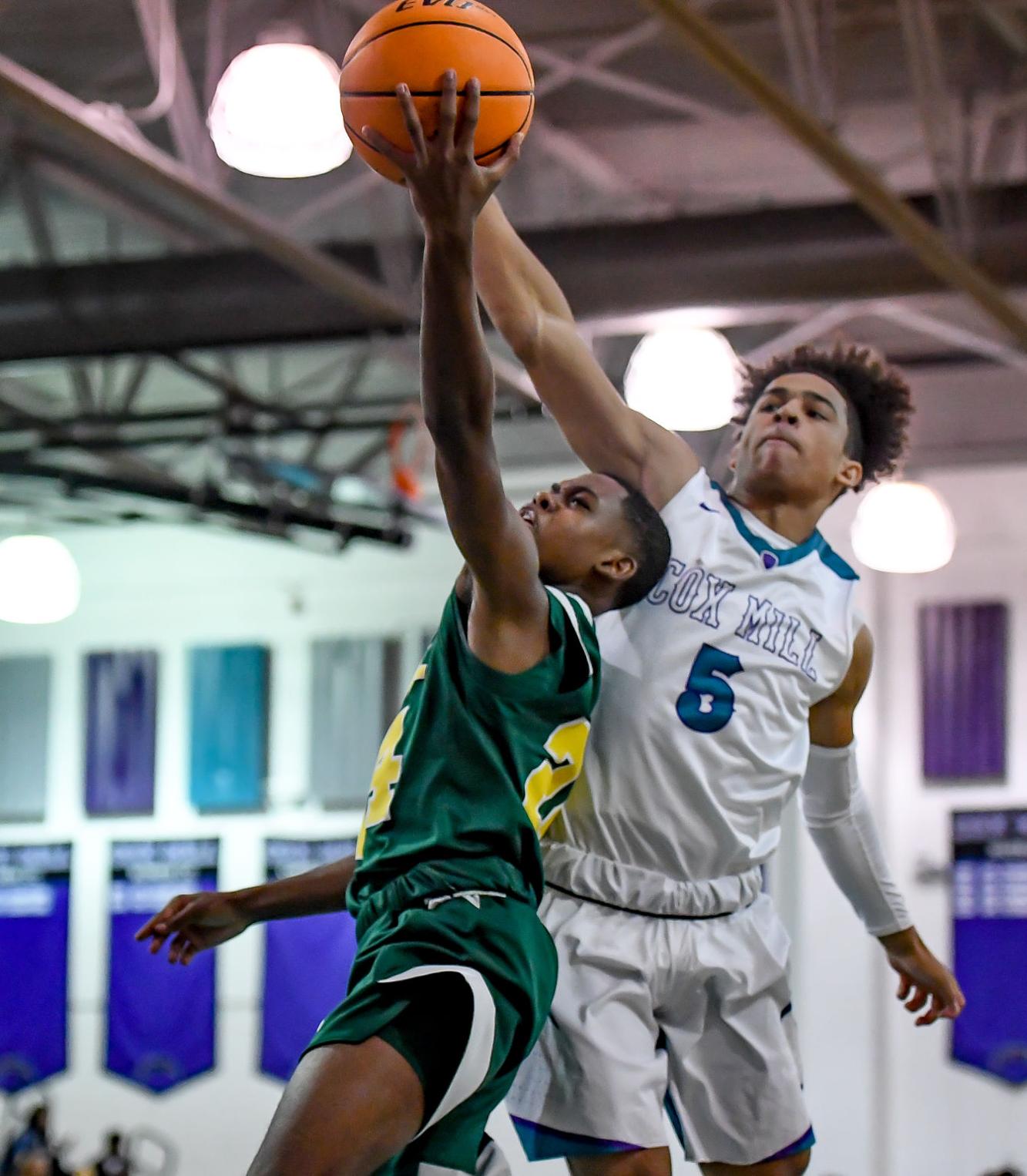 BOYS BASKETBALL Cox Mill uses new style to defeat Vikings, clinch another regularseason title