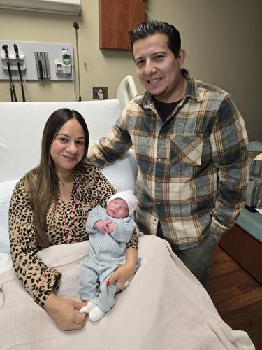 Baby Sebastian and parents.jpg