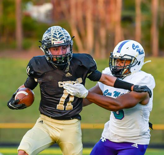 Cox Mill defeated Concord 21-20 on a botched extra point with less than a minute to play.