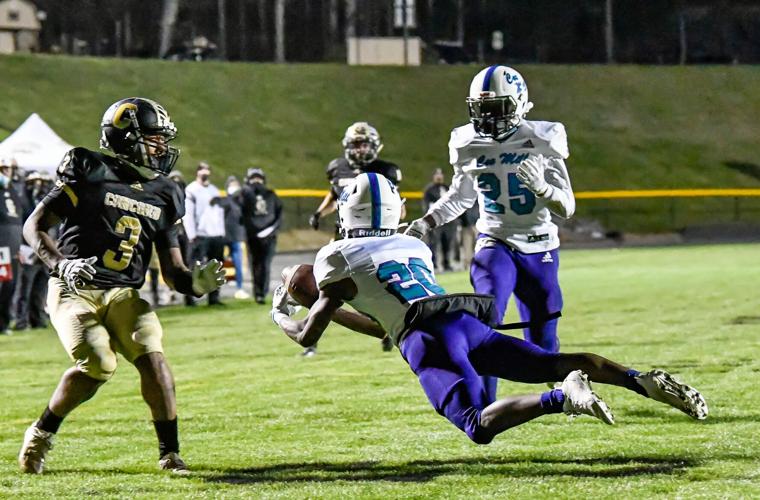 Cox Mill defeated Concord 21-20 on a botched extra point with less than a minute to play.