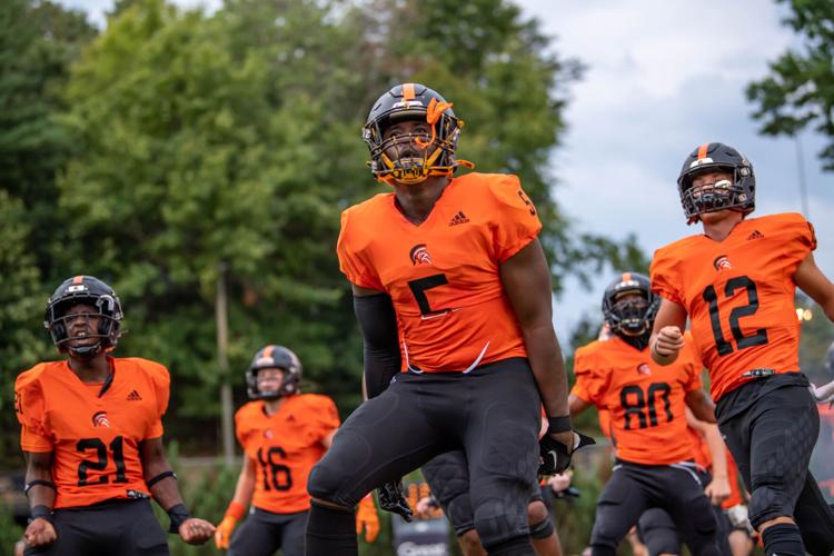 The Chargers defeated the Trojans 45-6 to win the Coddle Creek trophy.