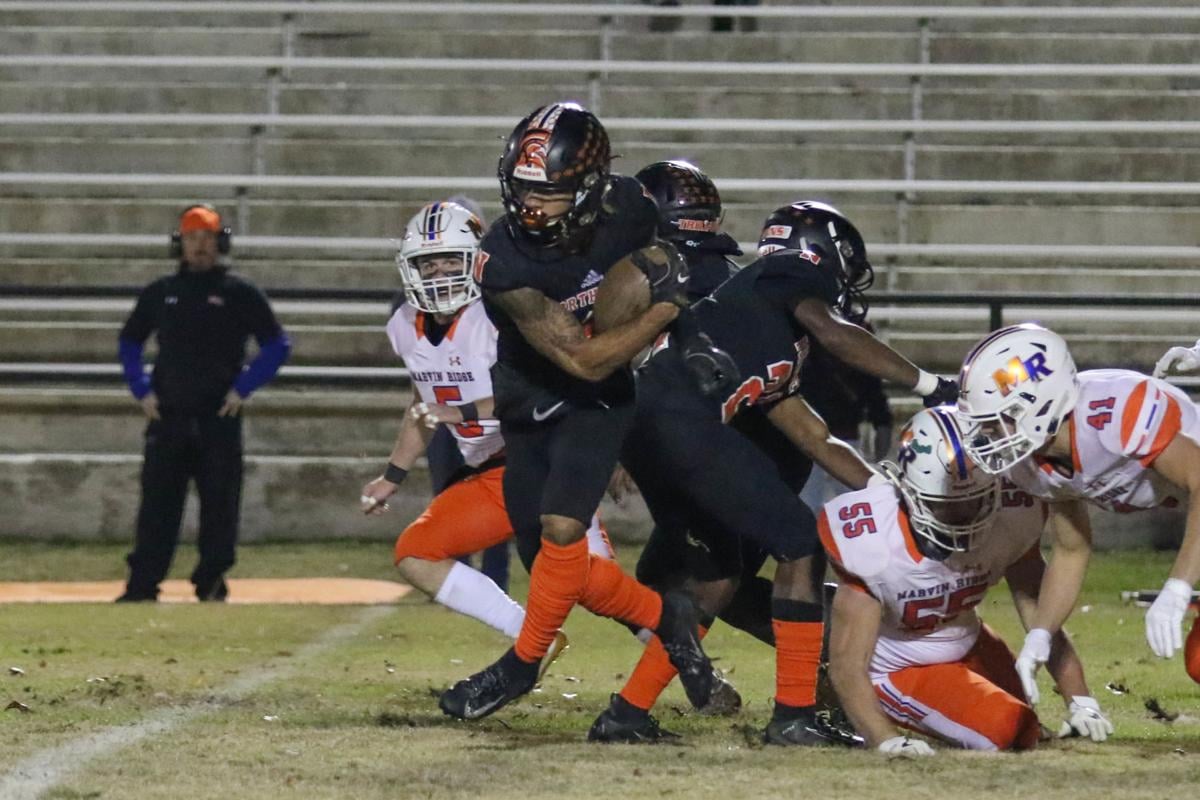 High School Football Trojans Survive Tough First Round Matchup