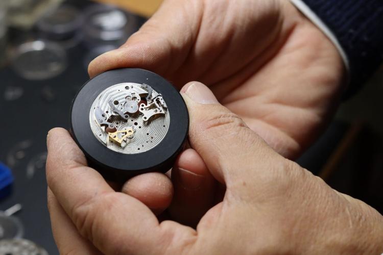 Cédric Johner, a renowned watchmaker, at work, in a job that requires the ultimate in precision.