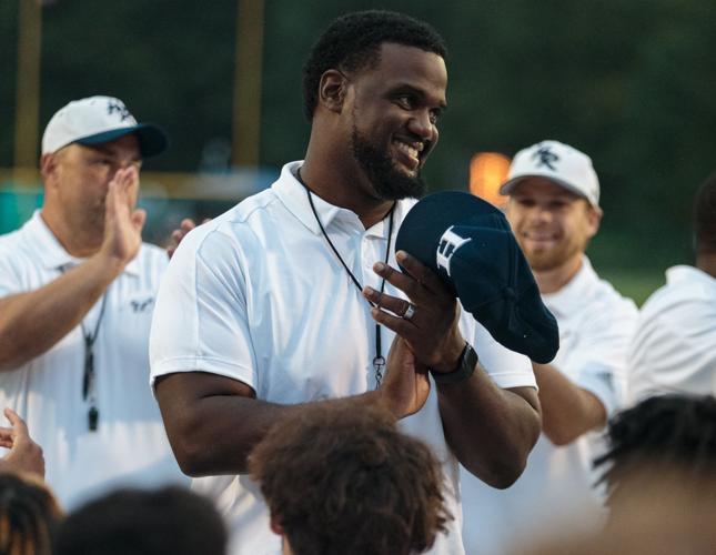 Hickory Ridge's first year head coach Jupiter Wilson celebrates his first victory on Saturday evening at Central Cabarrus High School. After trailing 20-0 at halftime to the Vikings, the Ragin' Bulls made an incredible comeback to win 27-20.