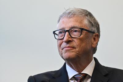 Microsoft founder Bill Gates reacts during a visit with Britain's Prime Minister Rishi Sunak to the Imperial College University on Feb. 15, 2023, in London, England.