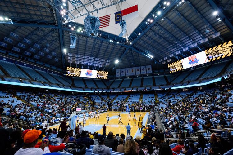 Image gallery from the 2021-22 NCHSAA Class 3A State Championship game between the Jay M. Robinson Bulldogs and the Farmville Central Jaguars at UNC Chapel HillÕs Dean E. Smith Center.  The Bulldogs defeated the Jaguars 70-68 to win the championship.