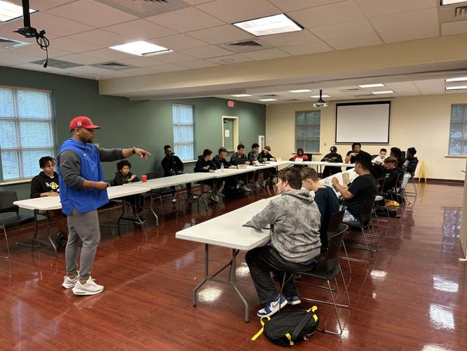 Arkevious Armstrong talking with kids