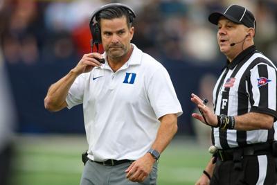 Oct 10, 2026; Atlanta, Georgia, USA; Duke Blue Devils head coach Manny Diaz talks to a referee against the Georgia Tech Yellow Jackets in the second quarter at Bobby Dodd Stadium at Hyundai Field. Mandatory Credit: Brett Davis-Imagn Images