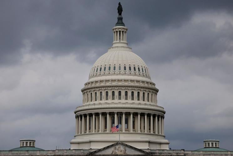 U.S. flags at half staff on Capitol Hill after the death of U.S. Sen. Lindsey Graham (R-SC) in Washington