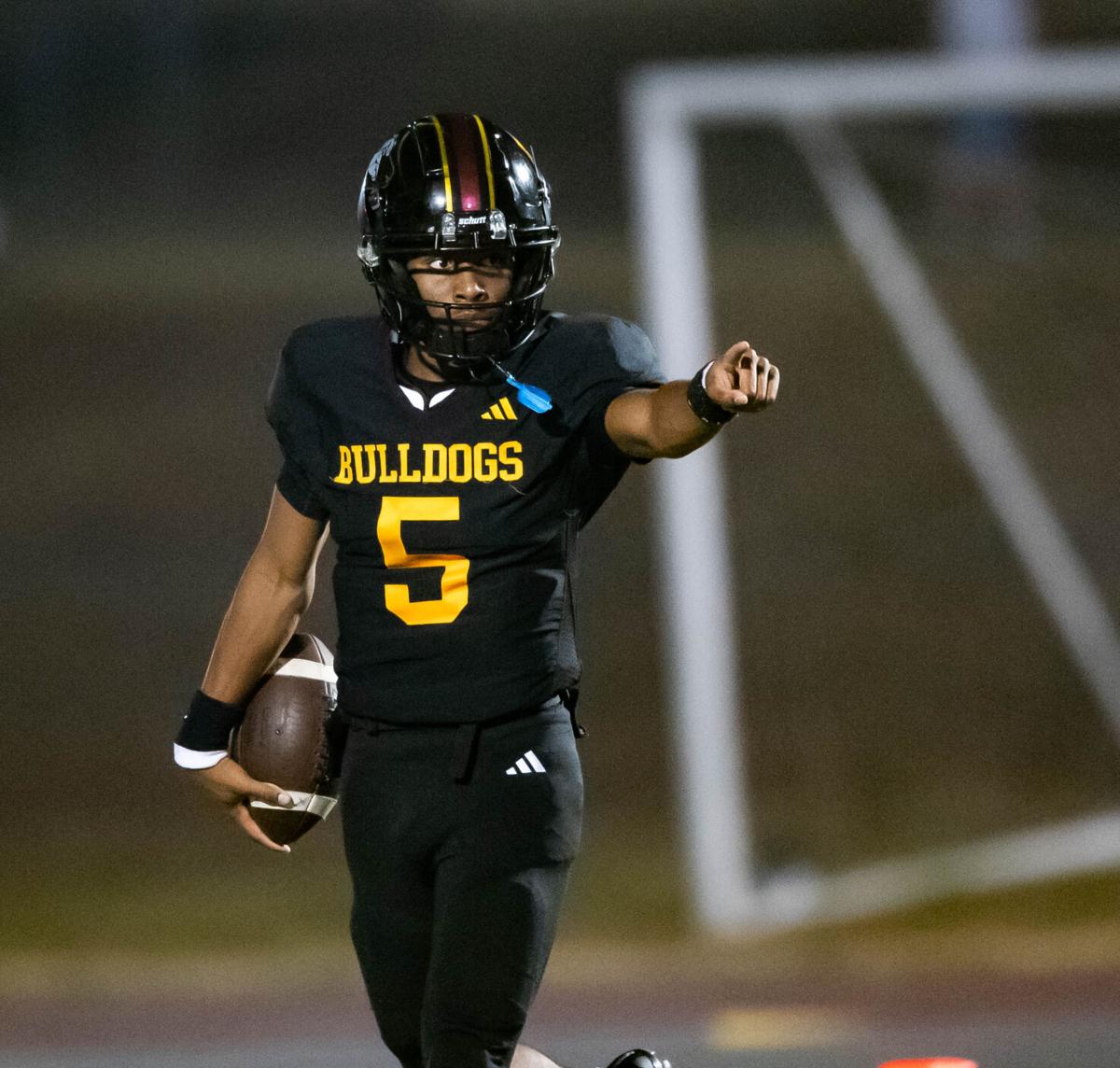 Bulldogs beat the Grizzlies in the third round of the 2025 NCHSAA Football Championship playoff game 41 - 33.