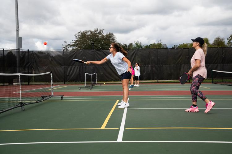 Residents of Loudoun County, Va. and surrounding areas play pickleball at Hal & Berni Hanson Regional Park on Sept. 28, 2026. The construction of the 257-acre regional park was made possible by tax revenue from data centers in the region, according to loca