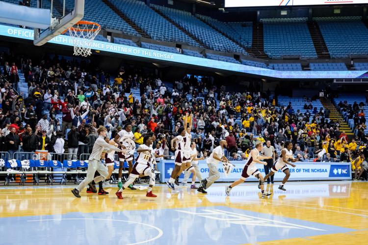 Image gallery from the 2021-22 NCHSAA Class 3A State Championship game between the Jay M. Robinson Bulldogs and the Farmville Central Jaguars at UNC Chapel HillÕs Dean E. Smith Center.  The Bulldogs defeated the Jaguars 70-68 to win the championship.