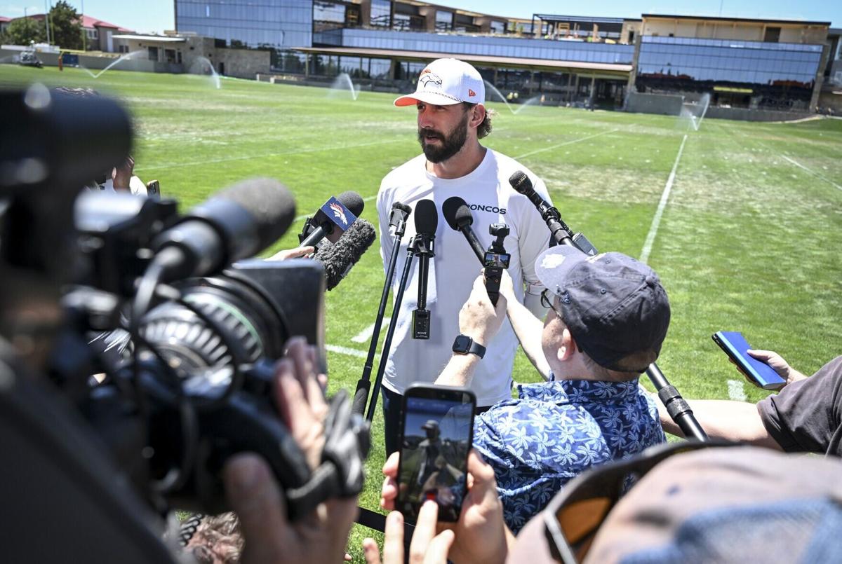 Offensive coordinator Davis Webb of the Denver Broncos speaks to members of the media during OTAs at the Broncos Park in Centennial, Colorado on Thursday, June 11, 2026.