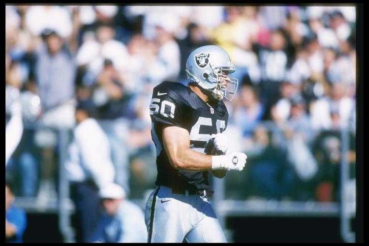Defensive lineman Mike Morton of the Oakland Raiders looks on during a game against Detroit Lions at the Oakland-Alameda County Coliseum in Oakland, California, Oct. 13, 1996.