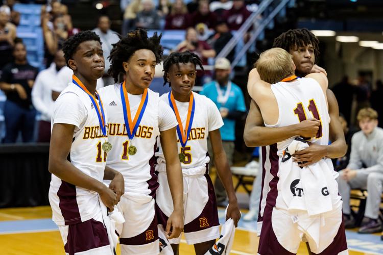 Image gallery from the 2021-22 NCHSAA Class 3A State Championship game between the Jay M. Robinson Bulldogs and the Farmville Central Jaguars at UNC Chapel HillÕs Dean E. Smith Center.  The Bulldogs defeated the Jaguars 70-68 to win the championship.