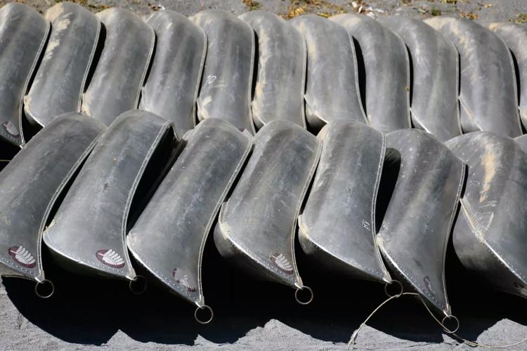 Canoes await paddlers at Burke’s Canoe Trips in Forestville along the Russian River.