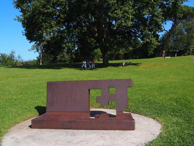Spanish artist Eduardo Chillida's works are dotted around the grounds, beneath trees or out in the open, framed by the green grass of this spacious sculpture park.
