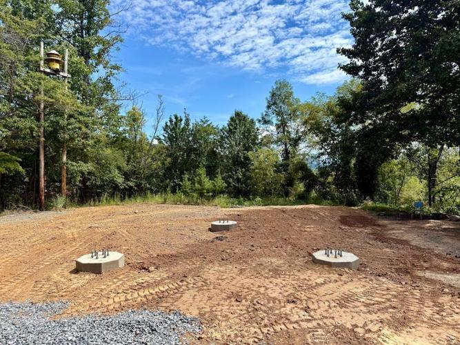 Concrete footers for a 75-foot line-of-sight communications tower, meant to bolster communications during extreme weather events, have been poured in Madison County.