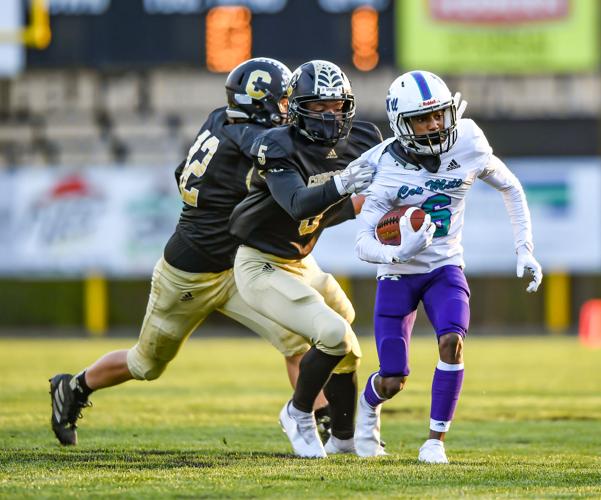 Cox Mill defeated Concord 21-20 on a botched extra point with less than a minute to play.