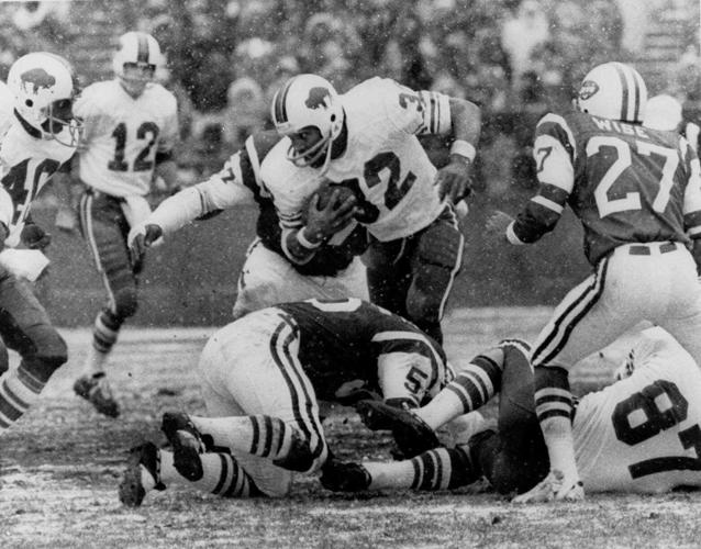 O.J. Simpson TBN obit The Juice sets NFL record with 2,003 rushing yards for season (copy)