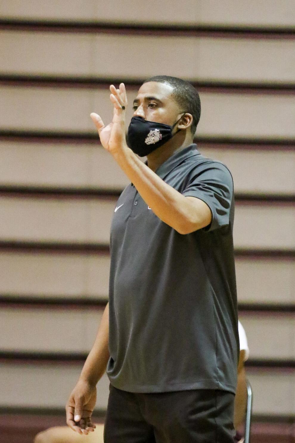 BOYS BASKETBALL Jay M. Robinson gets it going early against Northwest