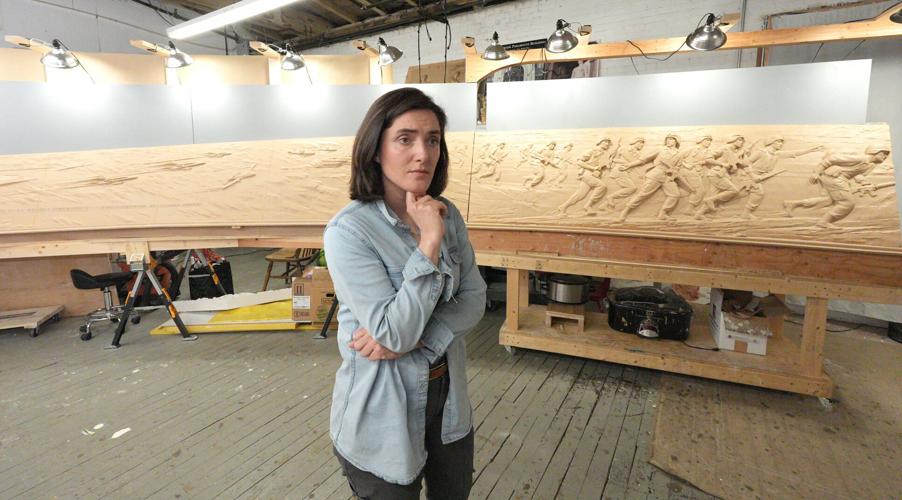 Emily Bedard, art director and lead scupltor for Foster Reeve, and artist behind the Desert Shield and Desert Storm Memorial, with her original clay creation of the memorial in her studio at the Garnerville Arts Center April 2, 2026.