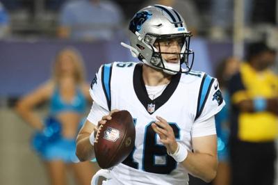 Aug 6, 2026; Canton, Ohio, USA; Carolina Panthers quarterback Haynes King (16) looks to pass during the game against the Arizona Cardinals at Tom Benson Hall of Fame Stadium. Mandatory Credit: Charles LeClaire-Imagn Images