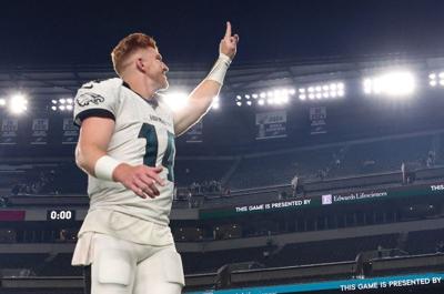 Aug 28, 2026; Philadelphia, Pennsylvania, USA; Philadelphia Eagles quarterback Andy Dalton (14) walks off the field after a loss against the Cincinnati Bengals at Lincoln Financial Field. Mandatory Credit: Bill Streicher-Imagn Images