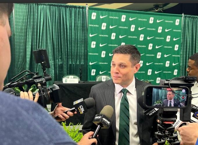 Miller talking with media