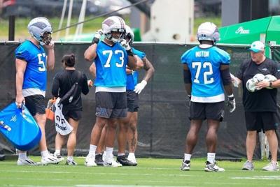 Jun 9, 2026; Charlotte, NC, USA; Carolina Panthers tackle Monroe Freeling (57), tackle Stone Forsythe (73) and offensive tackle Taylor Moton (72) during the first day of mini camp at Bank of America Stadium practice facility. Mandatory Credit: Jim Dedmo...