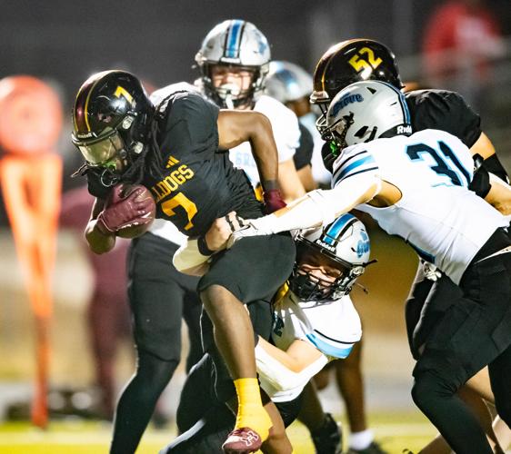 Bulldogs beat the Grizzlies in the third round of the 2025 NCHSAA Football Championship playoff game 41 - 33.