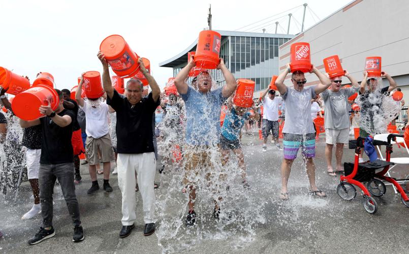 Yonkers Mayor Mike Spano, center, and New York State Assemblyman Nader Sayegh, left, participate in the 10th Annual Yonkers ALS Ice Bucket Challenge at Empire City Casino by MGM Resorts, Aug. 5, 2023. The event remains a catalyst for raising funds to suppo