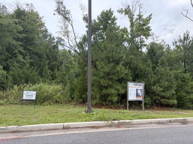 The site of a proposed 118-room Springhill Suites in Surf City is right next to the town hall.