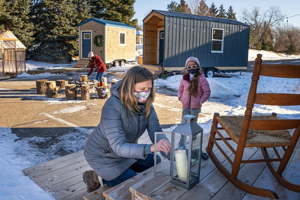 Church of the Open Door in Maple Grove is planning a 12- unit tiny-house "sacred settlement" for homeless people, similar to what's pictured here in 2021 with the co-founders of the nonprofit Settled.