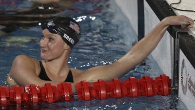 Breed of the U.S. looks at the clock after competing in the women's 200m freestyle final at the Pan American Games in Guadalajara