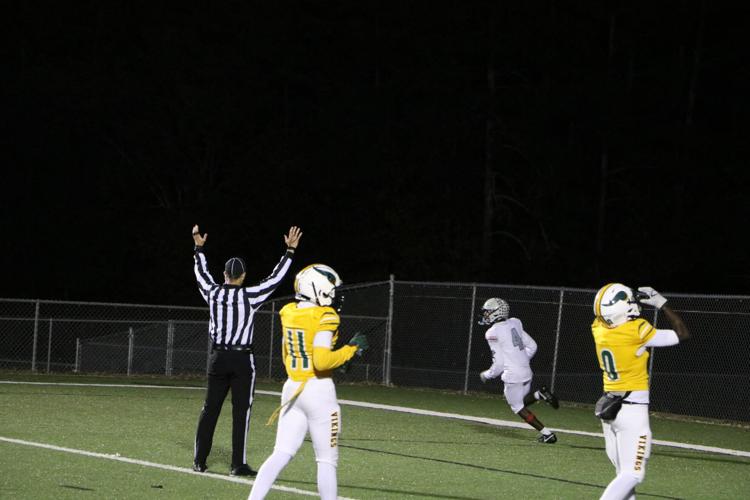 Camari McCrae with the Wolverine TD.JPG