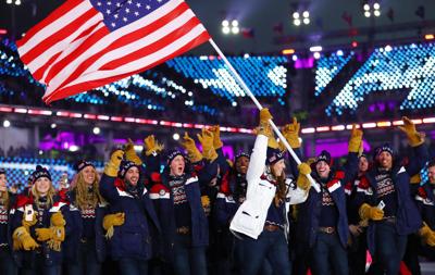 Erin Hamlin leads the delegation from the United States during the opening ceremony for the Pyeongchang 2018 Olympic Winter
