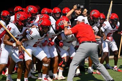 Sep 19, 2026; Nashville, Tennessee, USA;  NC State Wolfpack head coach Dave Doeren leads the team onto the field against the Vanderbilt Commodores during the first half at FirstBank Stadium.  Mandatory Credit: Steve Roberts-Imagn Images